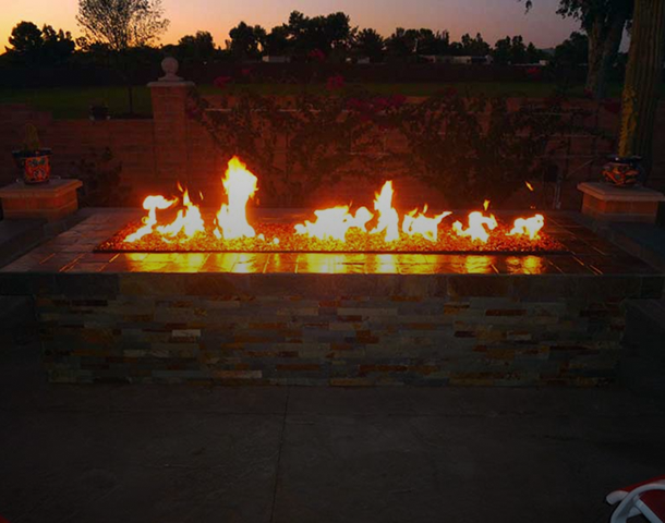 Stone fire pit with bright flames