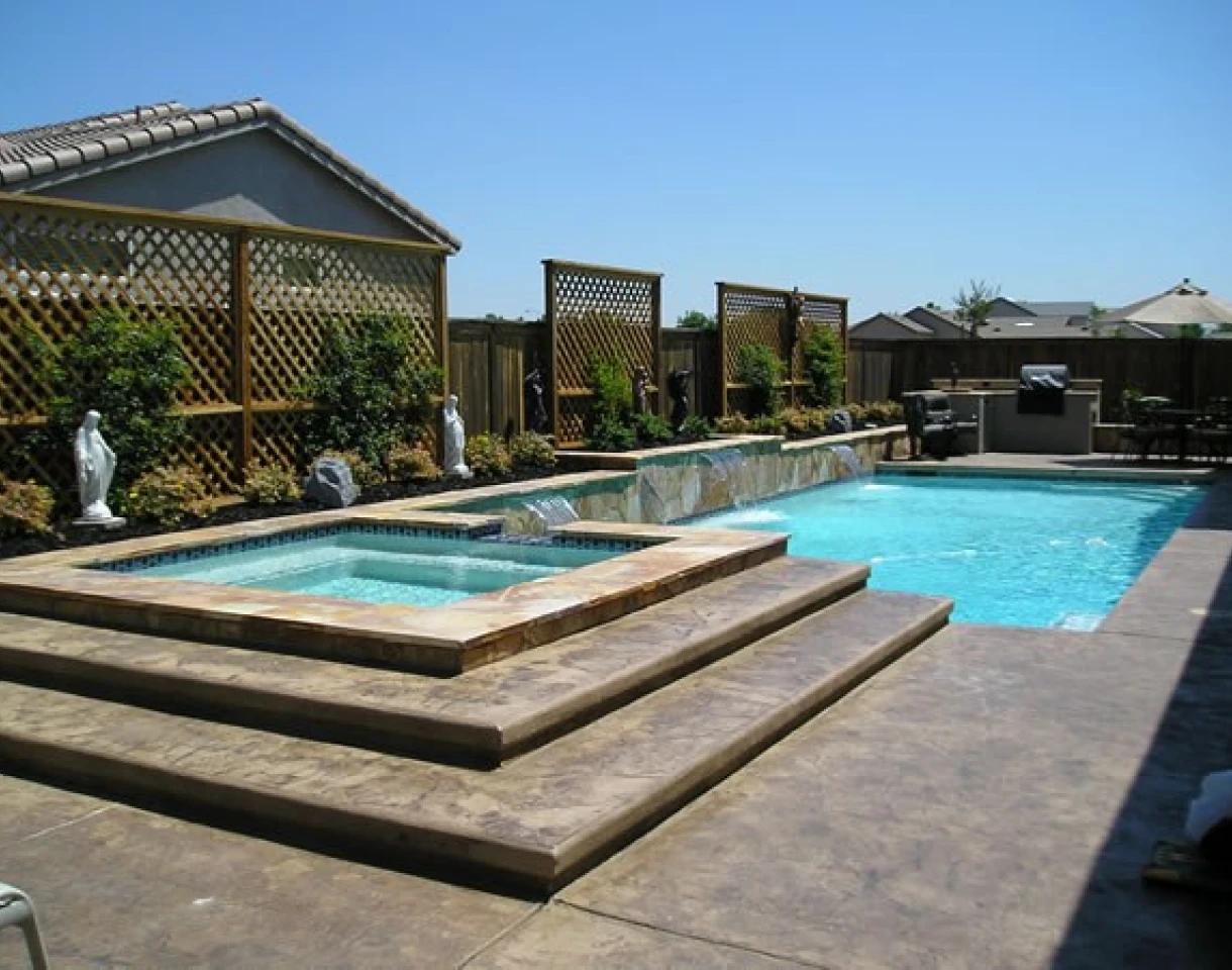 Modern pool design with landscaping